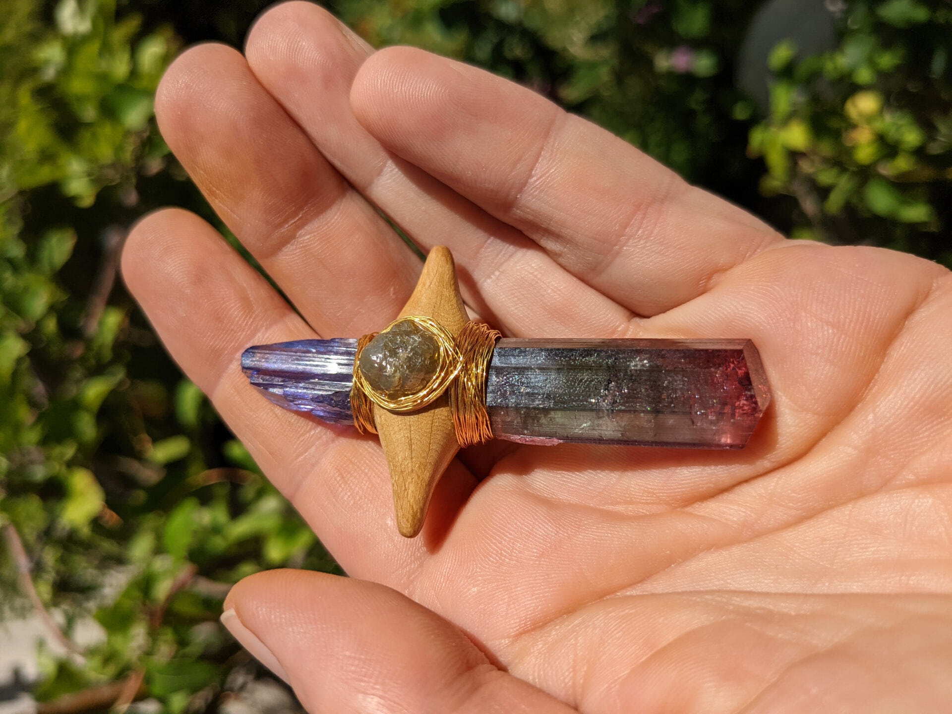 The Sword of Light, a hand-carved oak and crystal Coherence Artifact