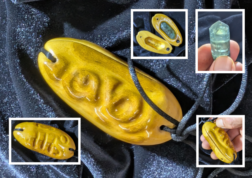 Spirit Craft, a green gem-quality apatite crystal held inside a carved oak root shell