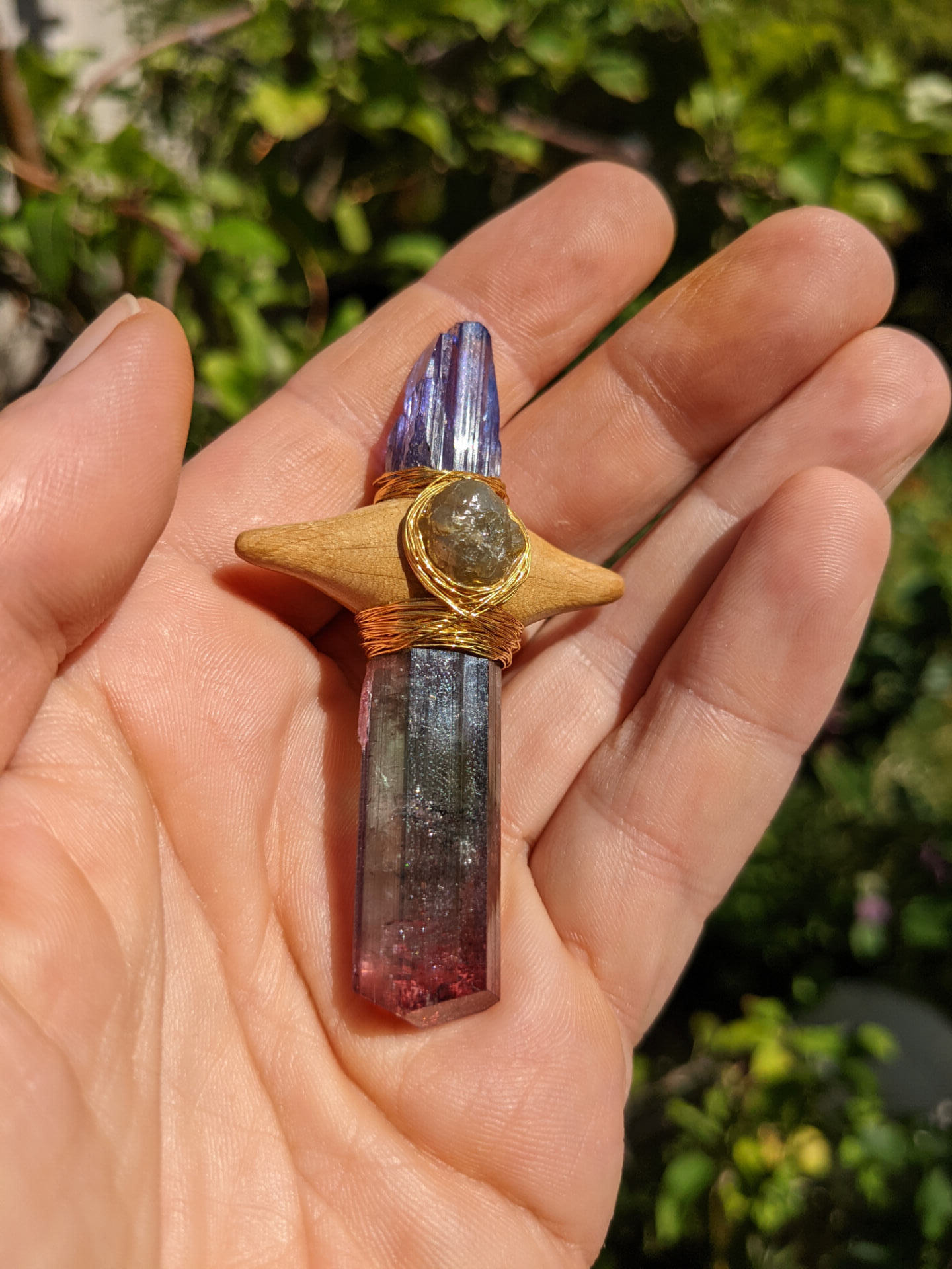 Detail of the Sword of Light showing tanzanite, watermelon tourmaline, diamond, oak and gold wire